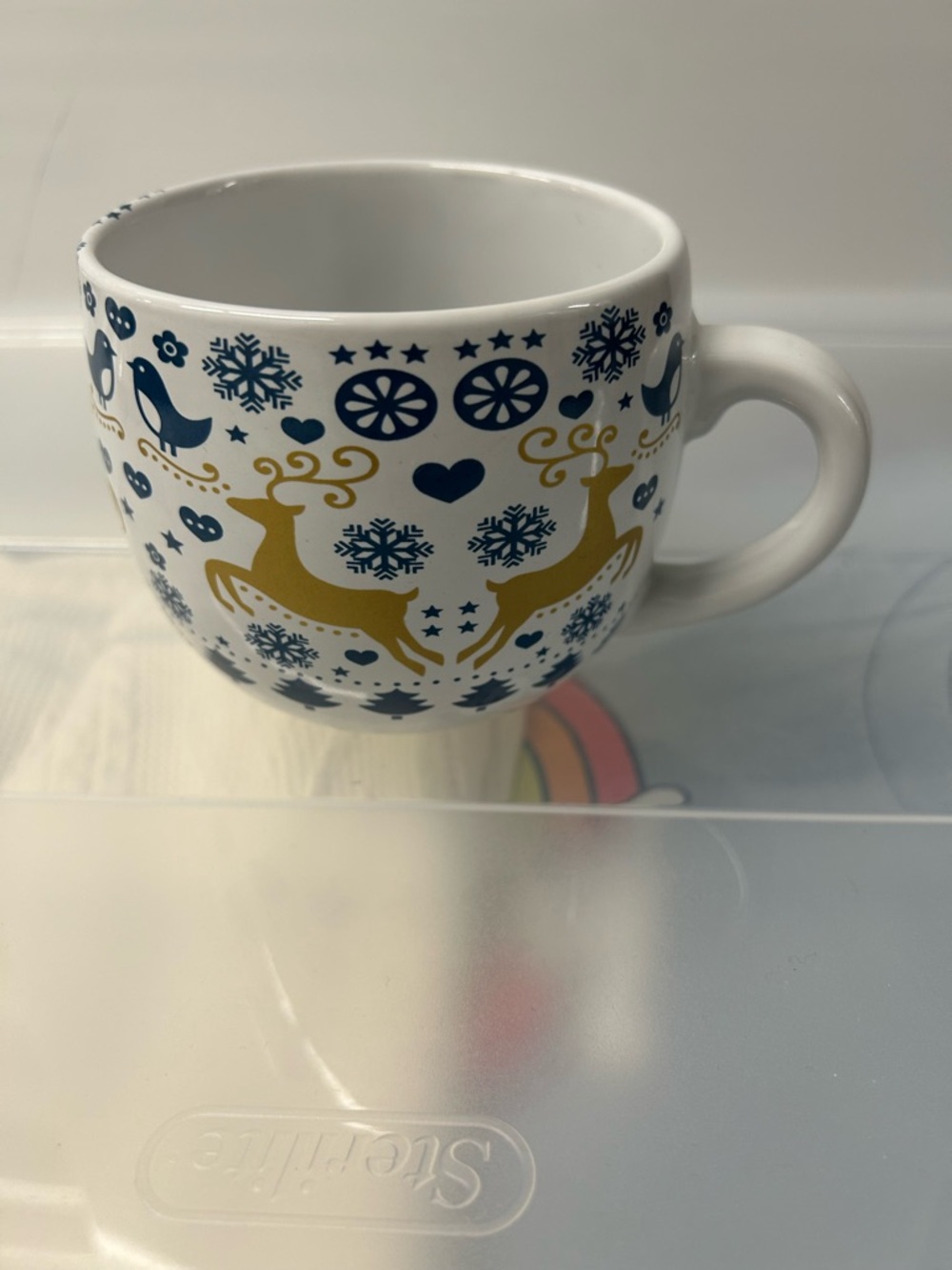 White Ceramic Holiday Reindeer Mug with Navy and Gold Accents